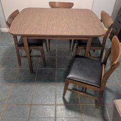 Dining Table And Four Chairs