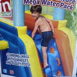Fresno pick up The Aquatic Adventure™ Mega Water Park is the ideal backyard play experience. This inflatable water park features a safe and sturdy wat