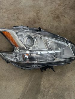 2009 Nissan Máxima lado pasajero luz