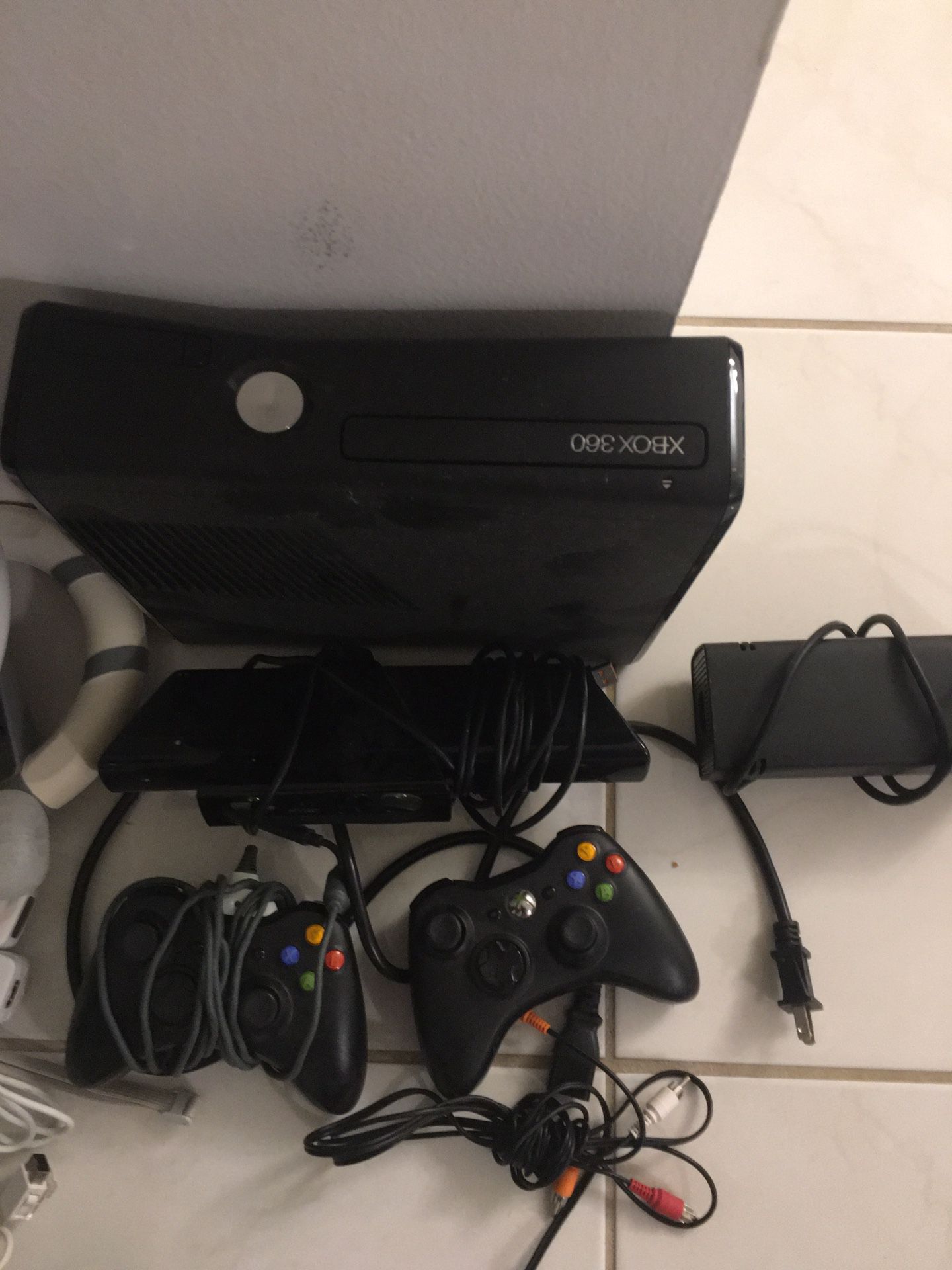 Xbox 360 with controllers and motion