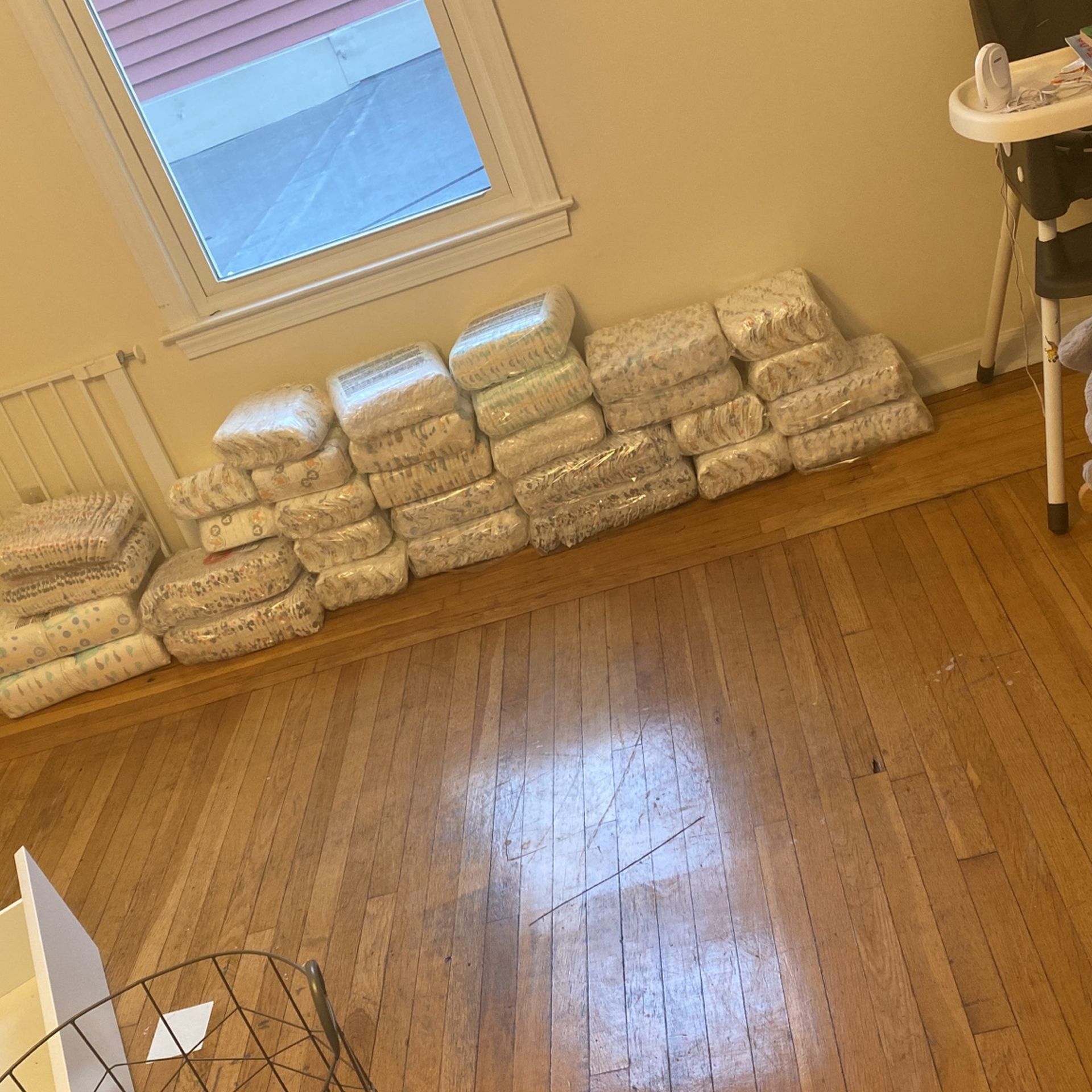 Two Packs Of Size 5 And 6 Diapers