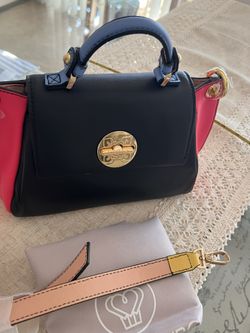 Gorgeous Leather, black and pink bag. Brand new in packaging. Femme De Cupcakes