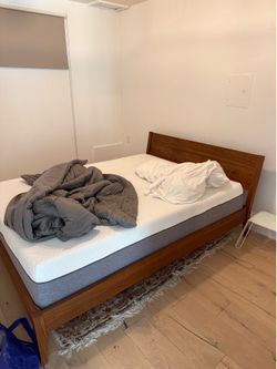 Like new bed frame and queen mattress.