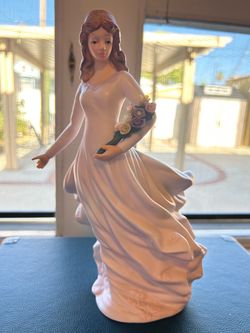 Porcelain Woman Figurine with Flower Bouquet