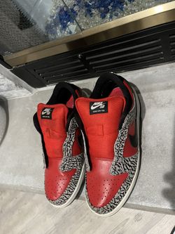 Used Supreme Nike SB dunk Low Red Cement 2012