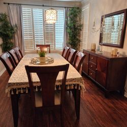 11 Piece Dining Room: Table, 8 Chairs, Buffet and a Mirror