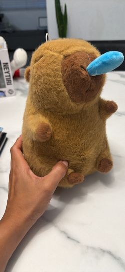 Peluche capibara