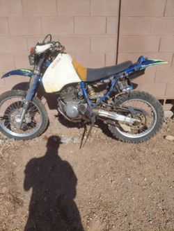Dr350 does run carburetor needs to be cleaned and I do have all the plastics for it