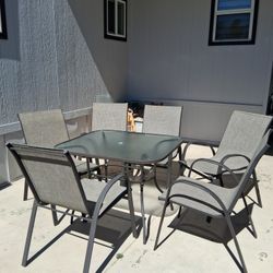 Outdoor Table And Chairs And Umbrella Stand 