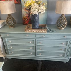 Blue Dresser With Gold Decorative Knobs