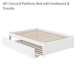 Platform bed with pull out twin bed
