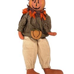 Fall Pumpkin Head Scarecrow Shelf Sitter Figurine Soft Plush 21" overall. This Fall Pumpkin Head Scarecrow Shelf Sitter Figurine is the perfect additi