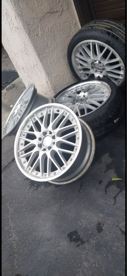 Rims (4)  tires (2)  215 /40/18