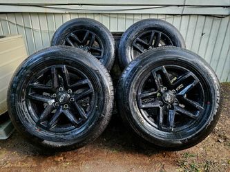 18" OEM Chevy Rims with tires