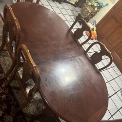 Wooden Dinner Table With Extension. Includes 6 Chairs