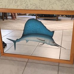Wood framed mirror with painted marlin