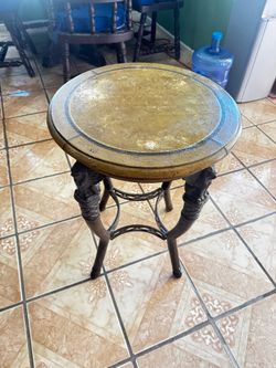 Maitland-Smith griffin side table with heavy base