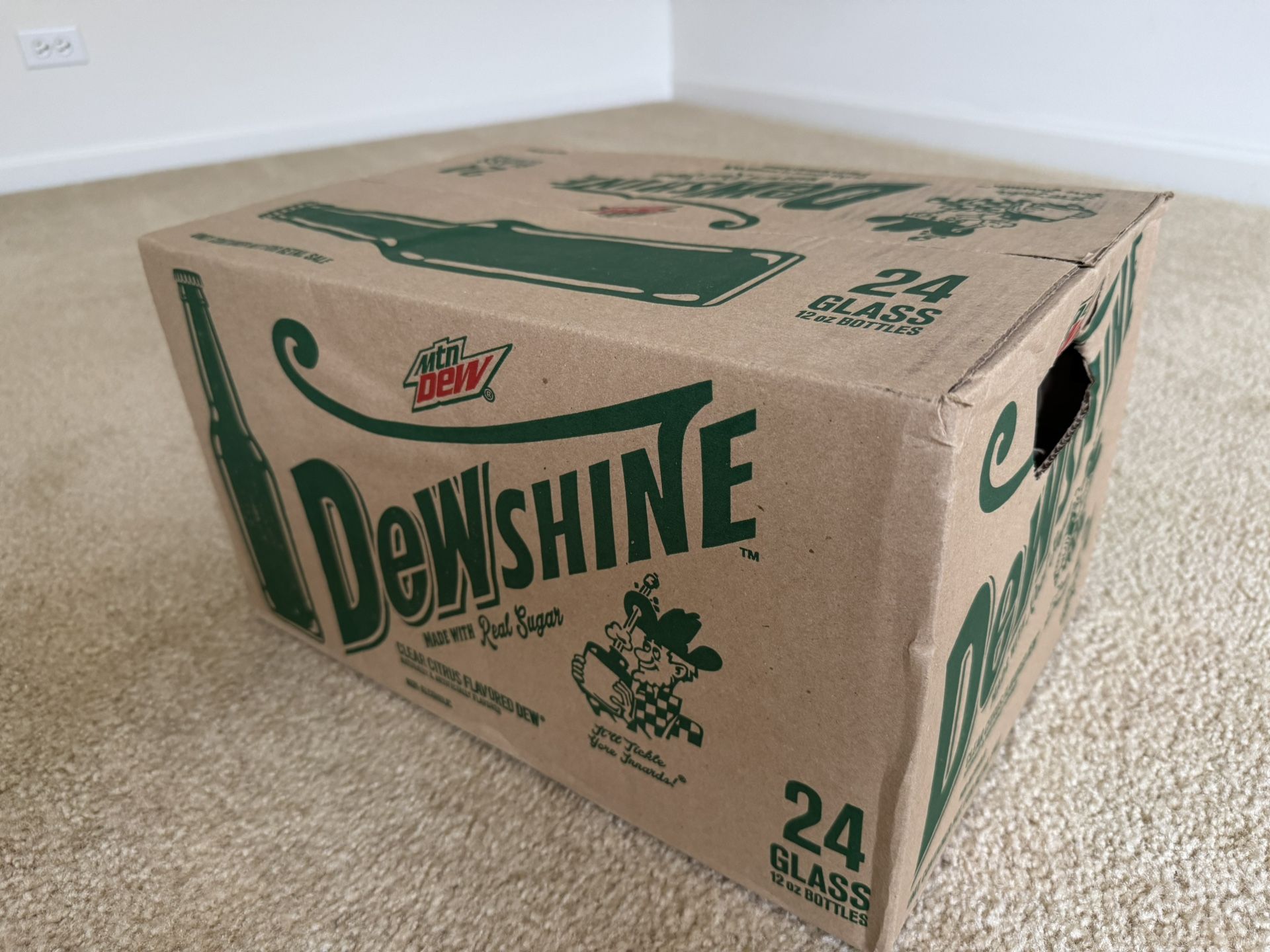 Mountain Dew Dewshine. Sealed case. 24 bottles.