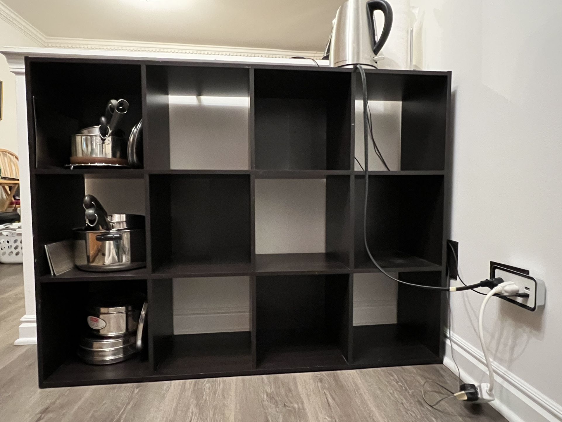 12 Cube Storage Organizer Shelf. Size 48”L x 36”H x 11 1/2”W. Cube size 11”L x 11”W x 11 1/2”Depth. $50 or Best Price. Good Condition.