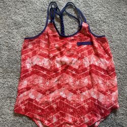red and white geometric star print tank top