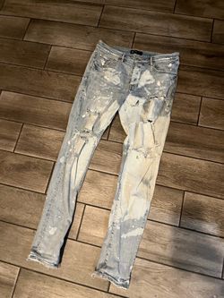 ripped purple jeans