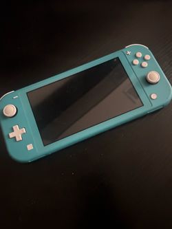 Nintendo switch lite with controller and Nintendo holder case
