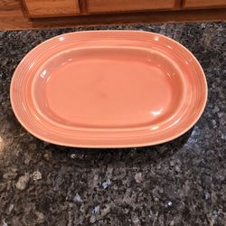 Vintage Stoneware Plate Size 11 inches Wide And 8 inches Long .  Brand Signature Houseware Inc.  Preowned Excellent Condition .  Has been on display i