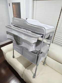 Saryocy Baby Changing Table, Mobile Folding Diaper Changing Station
Adjustable Height, Waterproof Surface, 2 Storage Drawers, Rolling Baby Nursery Org