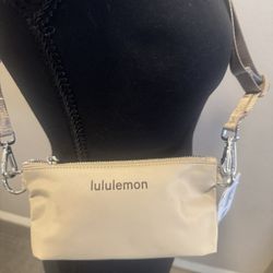 Lululemon sheer oak/ cross body . New with tag . • Large pouch only available and dimensions: 20.5cm x 5.5cm x 10cm (8.1" × 2.2"x 3.9") Fits a phone
