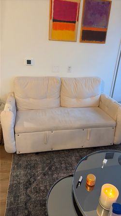 2 seater Cream pull out sofa
