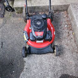 Troy-Bilt 21 in. 160 cc Honda Gas Walk Behind Push Mower with High Rear Wheels and 3-in-1 Cutting TriAction Cutting System