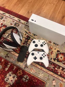 Xbox series one s with two controller
