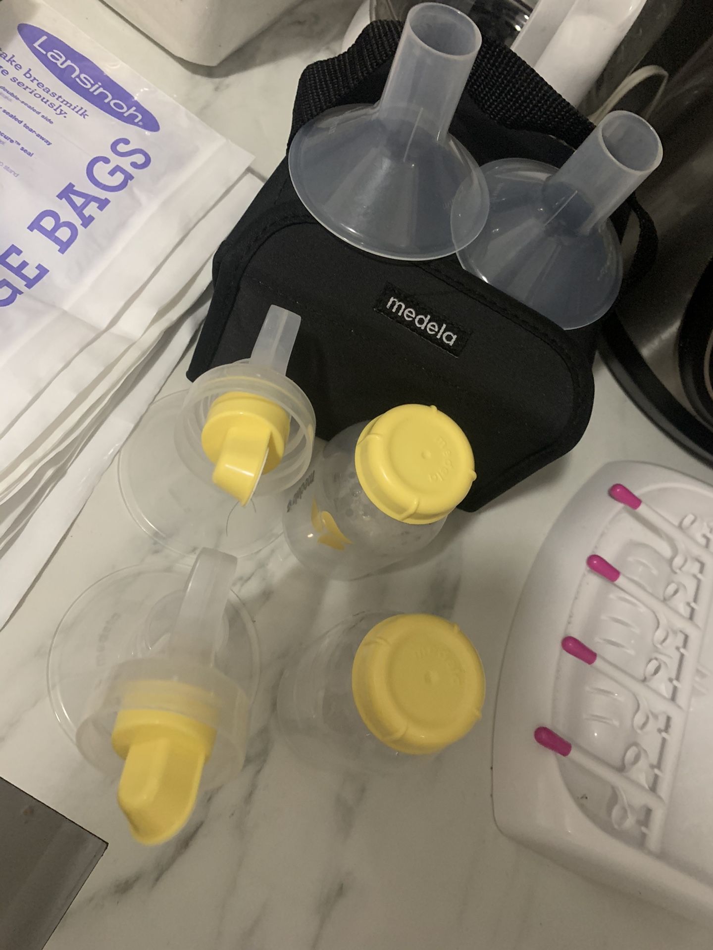 Medela BreastPump & Lansinosh Breadsmilk StorageBag Ask For Price