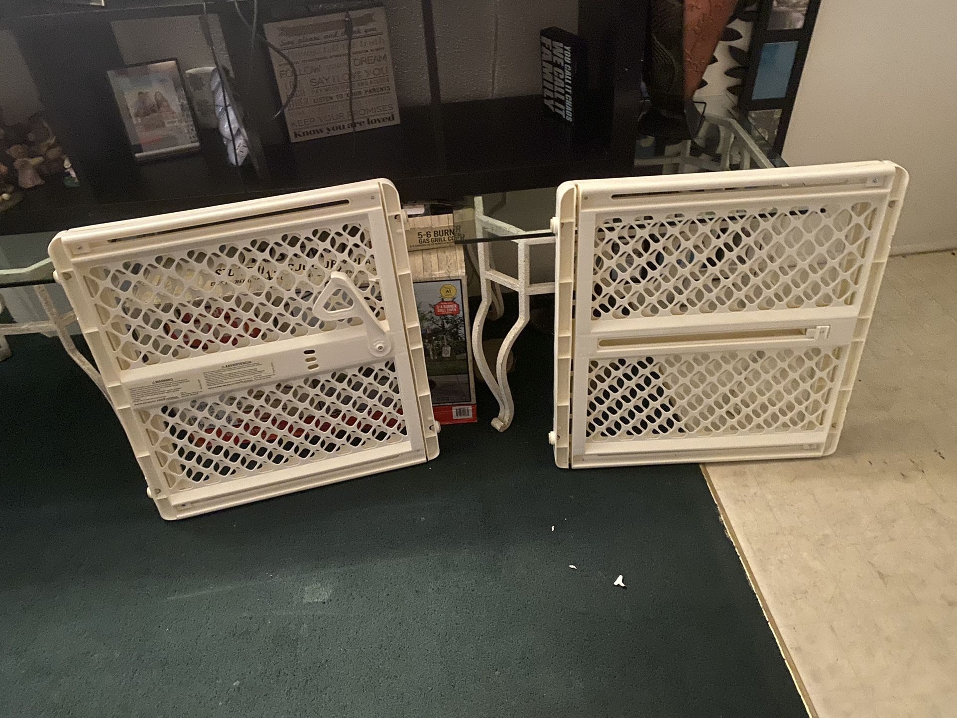 $40- 2 baby gates Sold together as a set only. Approx 2’ tall by 2’ wide before opening gate.