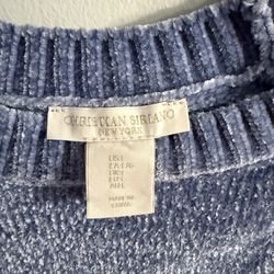 white and blue sweater