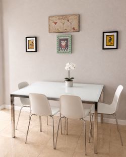 White Glass Dining Table with 4 Chairs