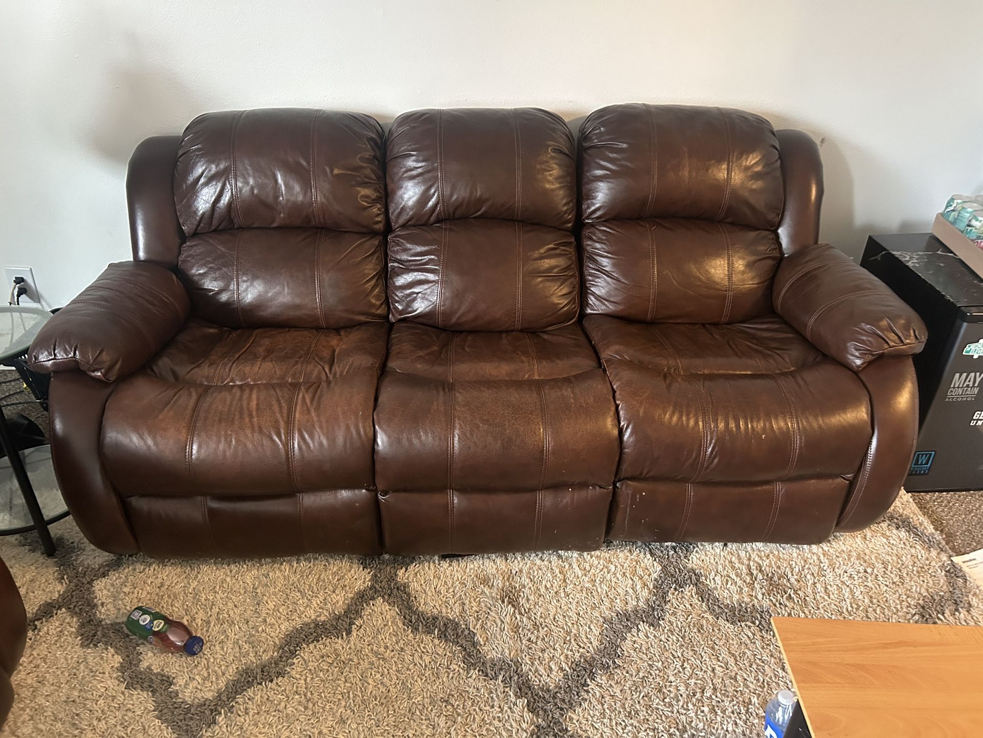 Two Burgundy Electric Recliners