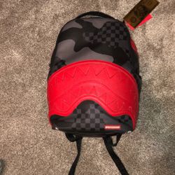 Red camo sprayground backpack (with tag)