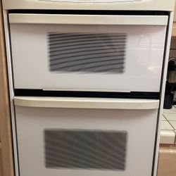 Oven With Microwave Oven On Top. 
