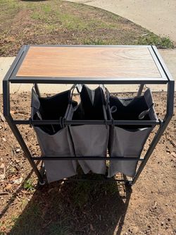 Laundry hamper on wheels