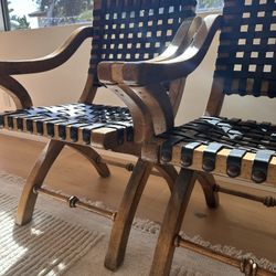 Pair of vintage wood and leather chairs