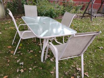 Patio table w/ 4 chairs! Metal & Glass! Tan in color!