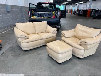 Leather love seat, chair , ottoman.