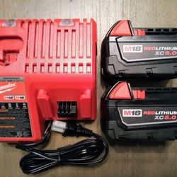 2 Milwaukee XC5.0 Batteries & Charger 