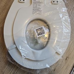 Children's & Adult Toilet Seat. 
2 in 1