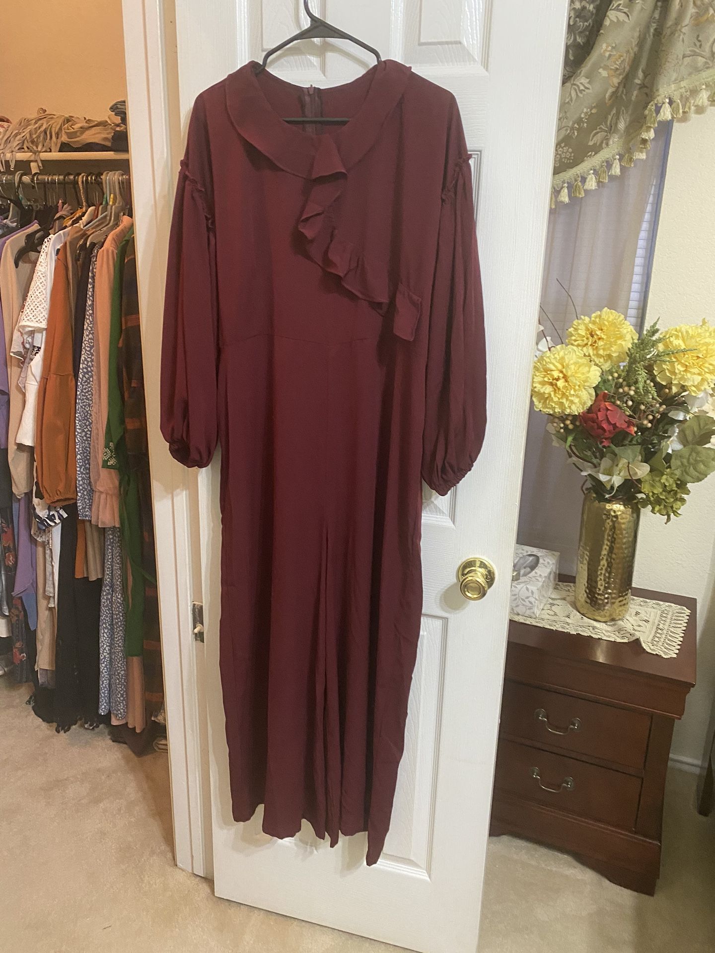 Handmade long sleeve overall with flowy wide leg style that is tailor made by clothing material bought myself. Did not fit me. It is size large 