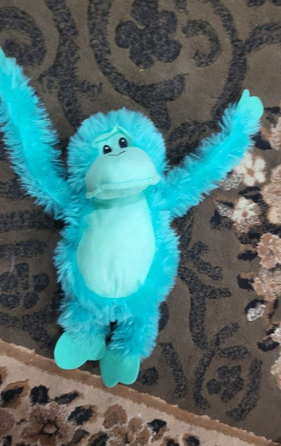 Mint green monkey plush
