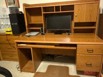 A wooden desk very heavy