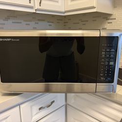 1.4 cu. ft. 1000W Sharp Black Carousel Countertop Microwave Oven (SMC1443CM)