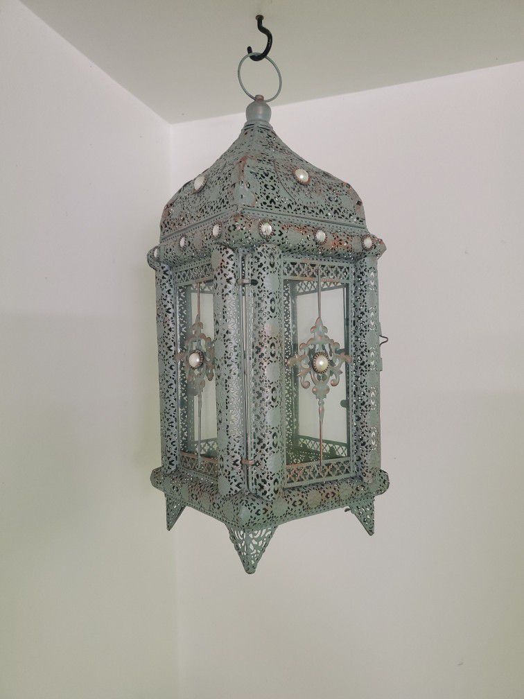Beautiful blue and bronze indoor/outdoor latern with glass.